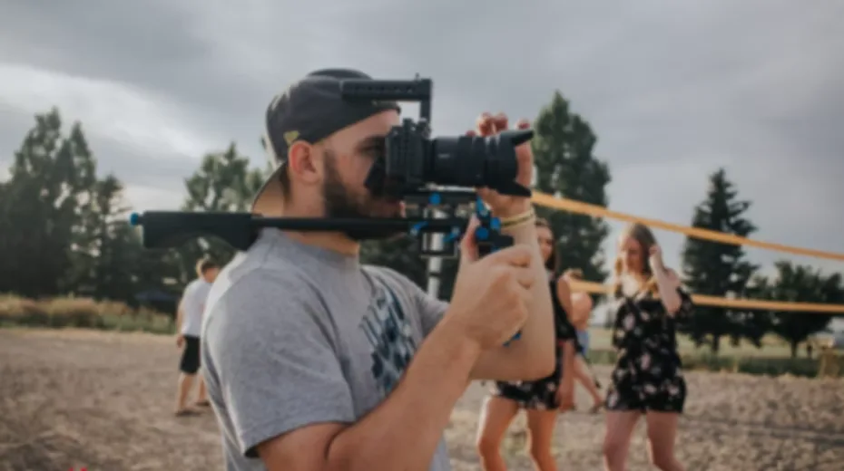 MEM Films video production in Wentzville, MO: videographer filming on location with a shoulder-mounted cinema camera rig
