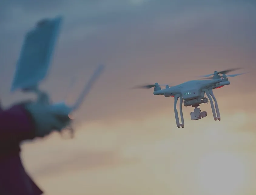 Aerial drone video production for Lake Saint Louis, MO: drone hovering against a soft evening sky