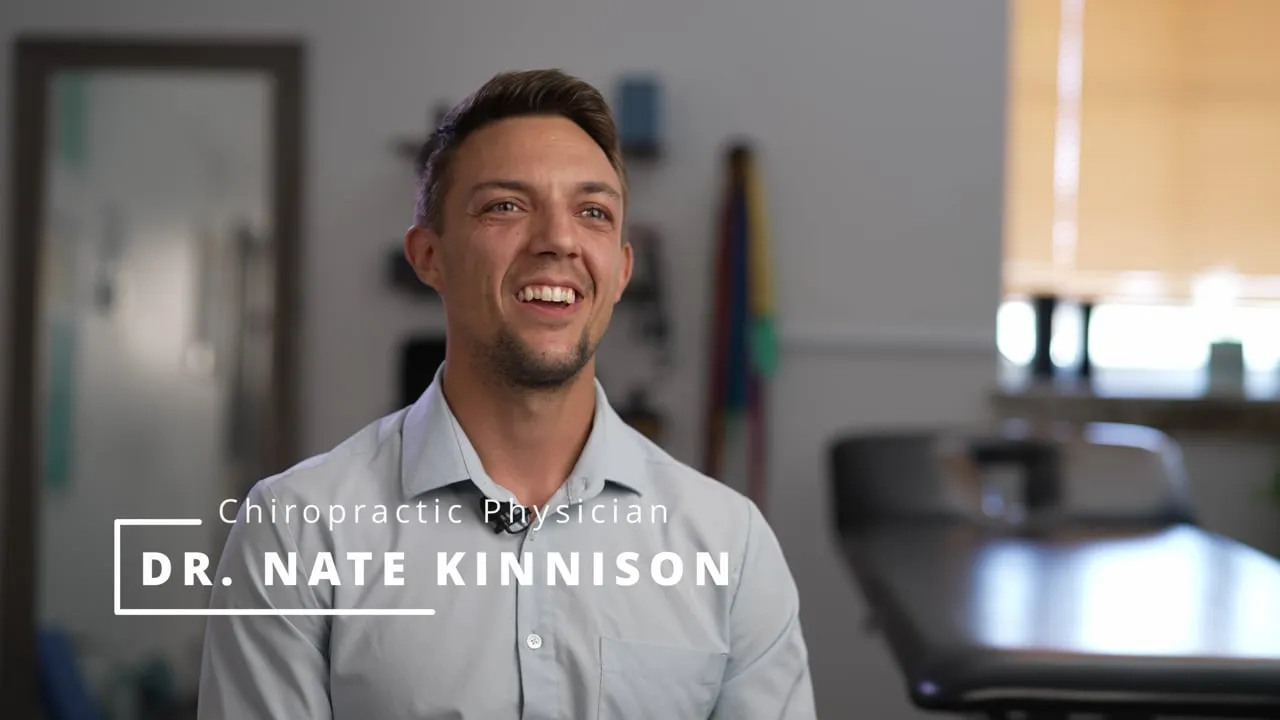Crossroads Chiropractic brand video: Dr. Nate Kinnison, chiropractic physician in Wentzville, MO, smiling in his treatment room